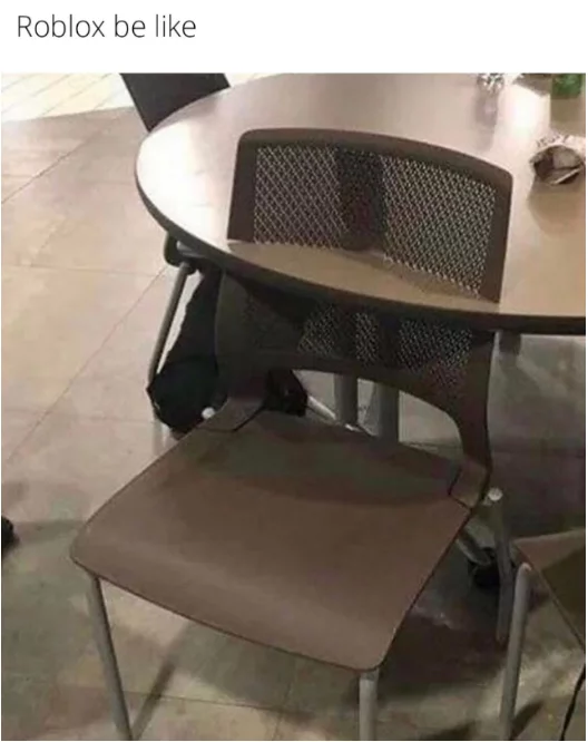 A chair glitching and clipping through the table.